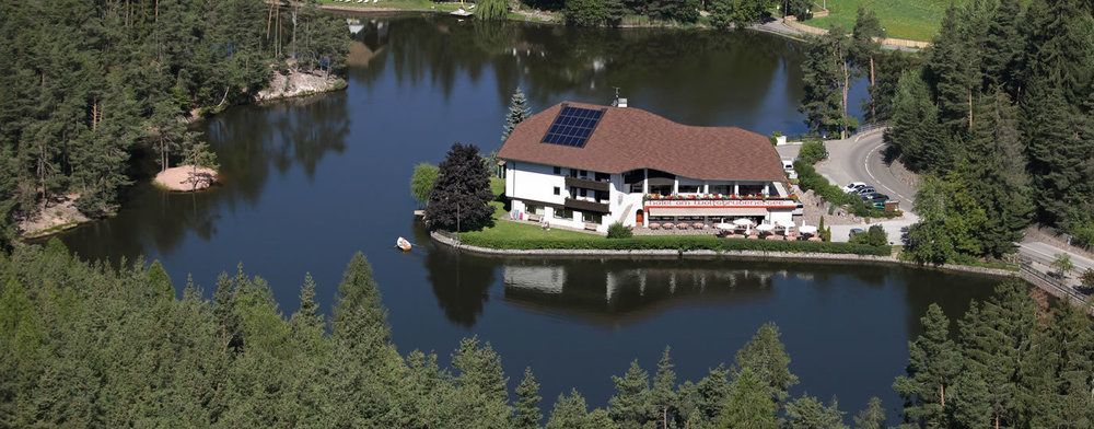 Hotel Am Wolfgrubenersee Oberbozen Buitenkant foto